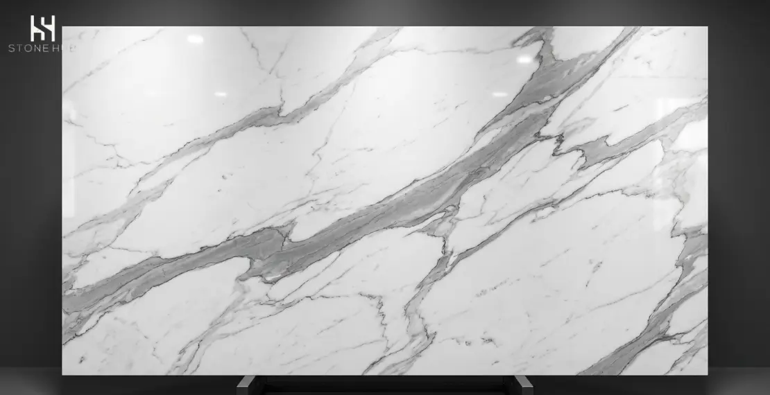 Close-up texture of authentic Italian Statuario marble with natural grey veining